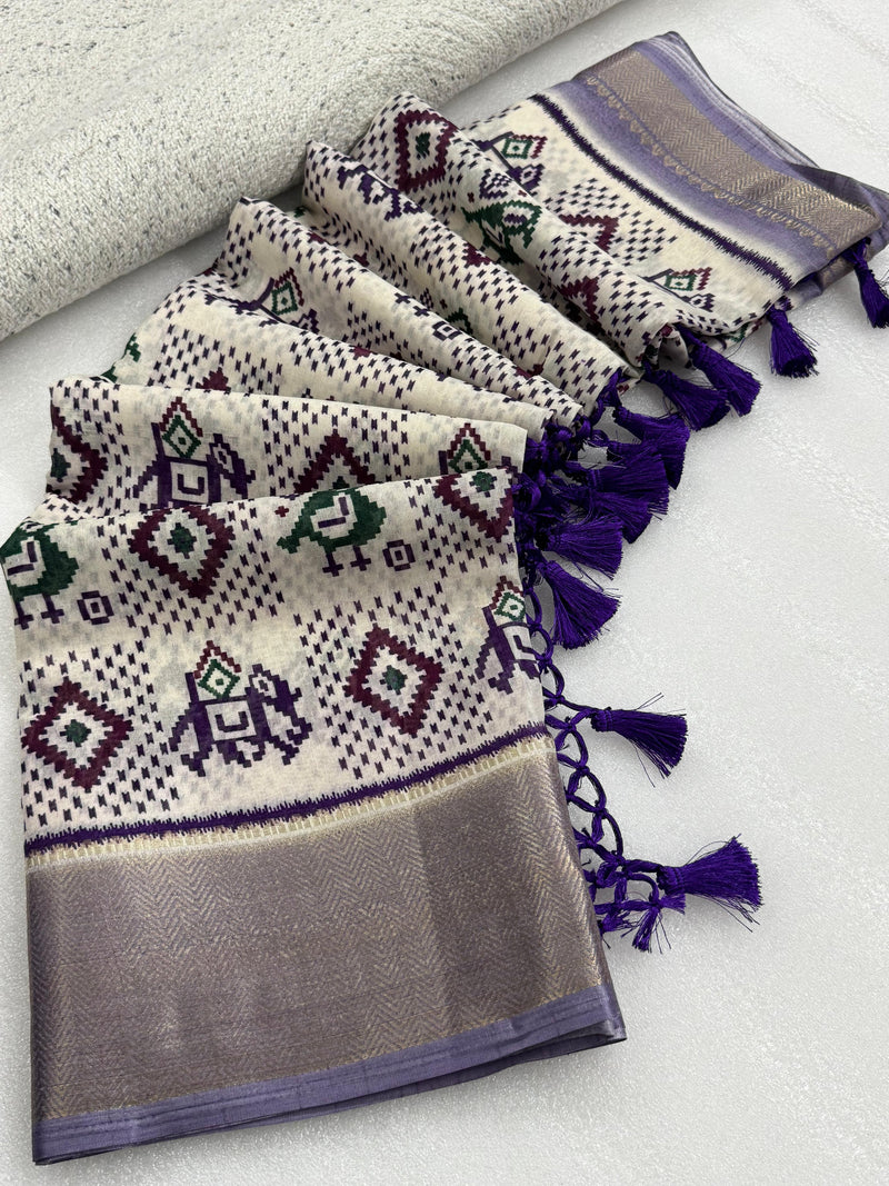 Ivory Ikat Silk Saree with Purple Border & Tassel Detailing