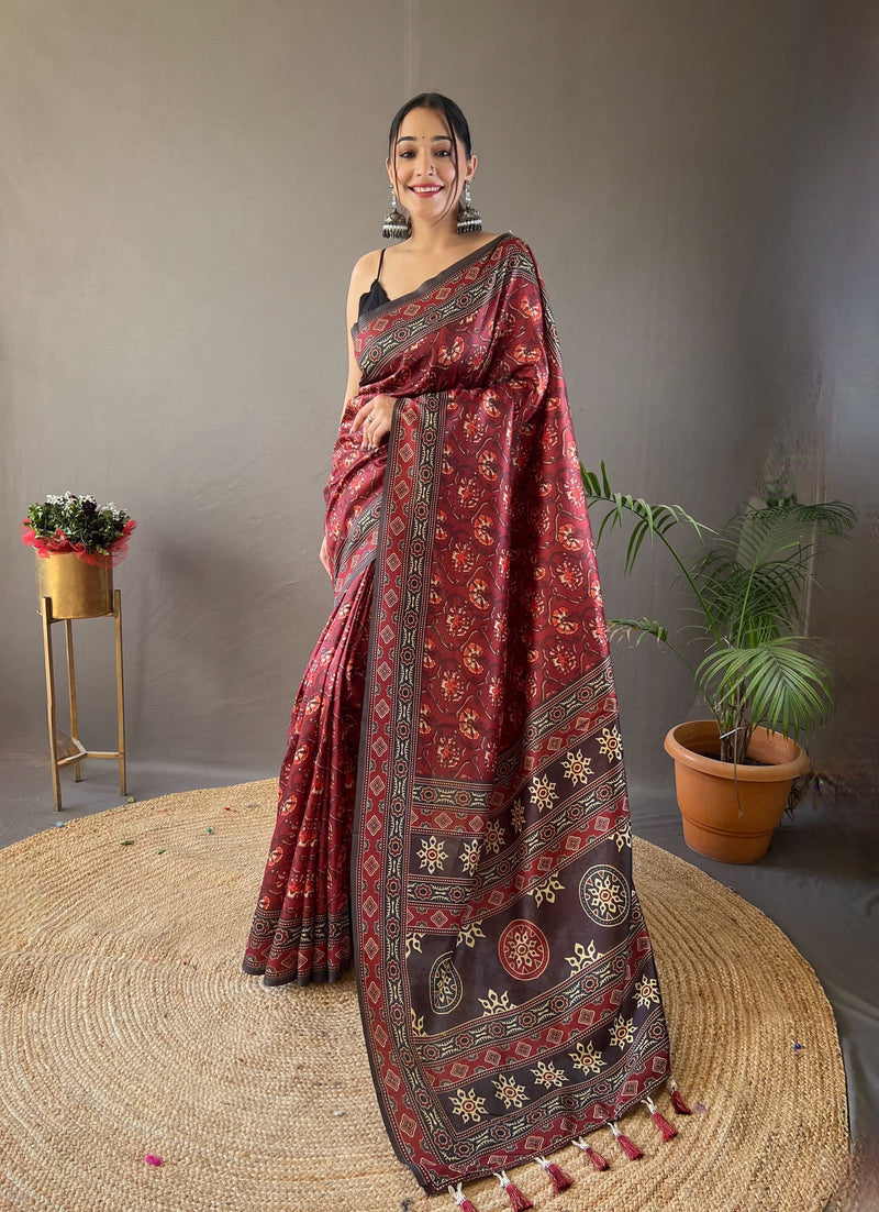 Deep Maroon Ajrakh-Inspired Printed Saree with Tassel Detailing