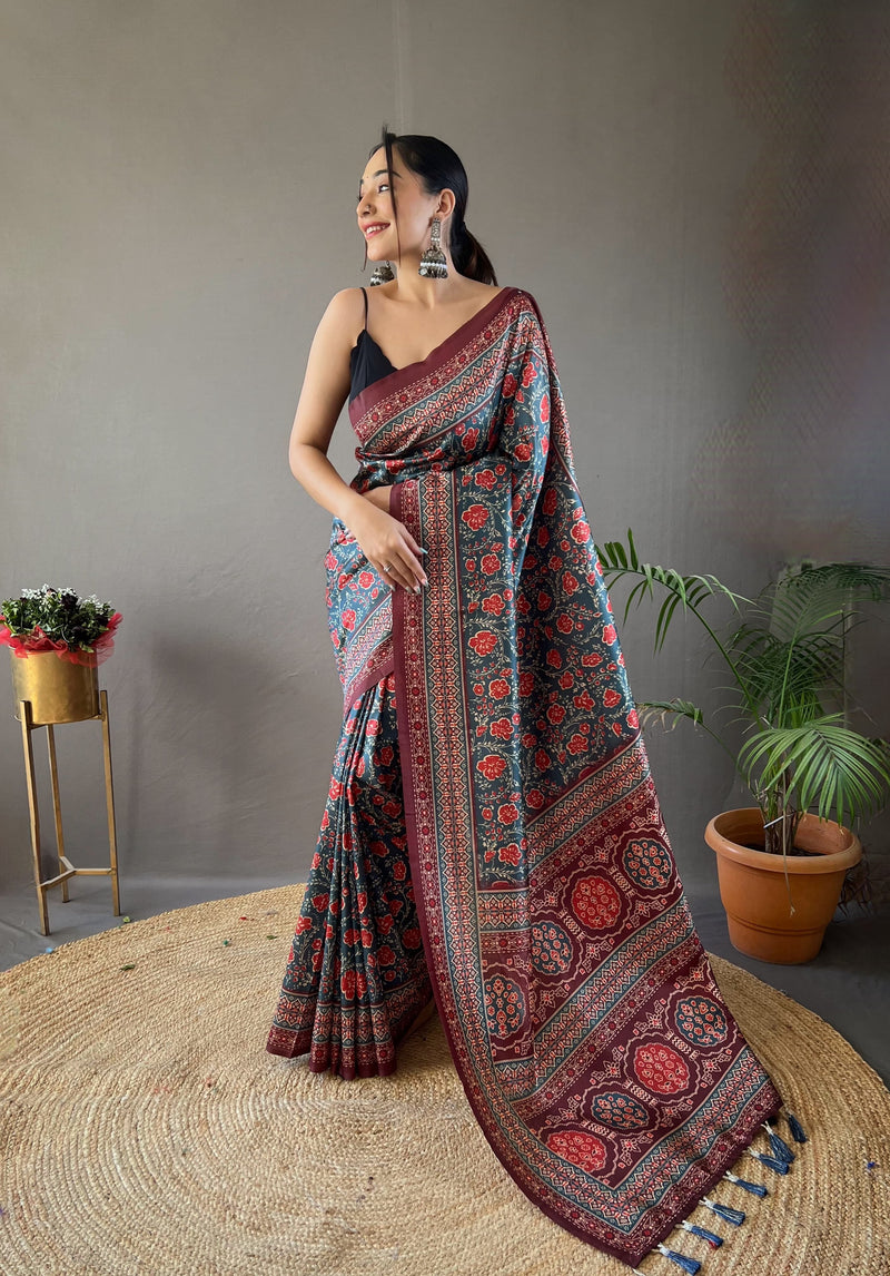 Maroon and Teal Floral Printed Saree with Traditional Border and Tassel Pallu