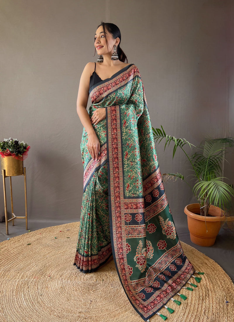 Green Floral Printed Saree with Traditional Border and Tassel Detailing
